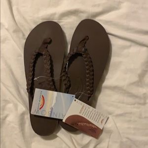 Brown rainbow twisted sister flip flops